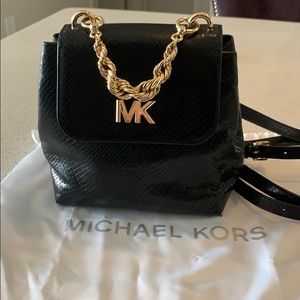 Micheal Kors mini embossed leather back pack